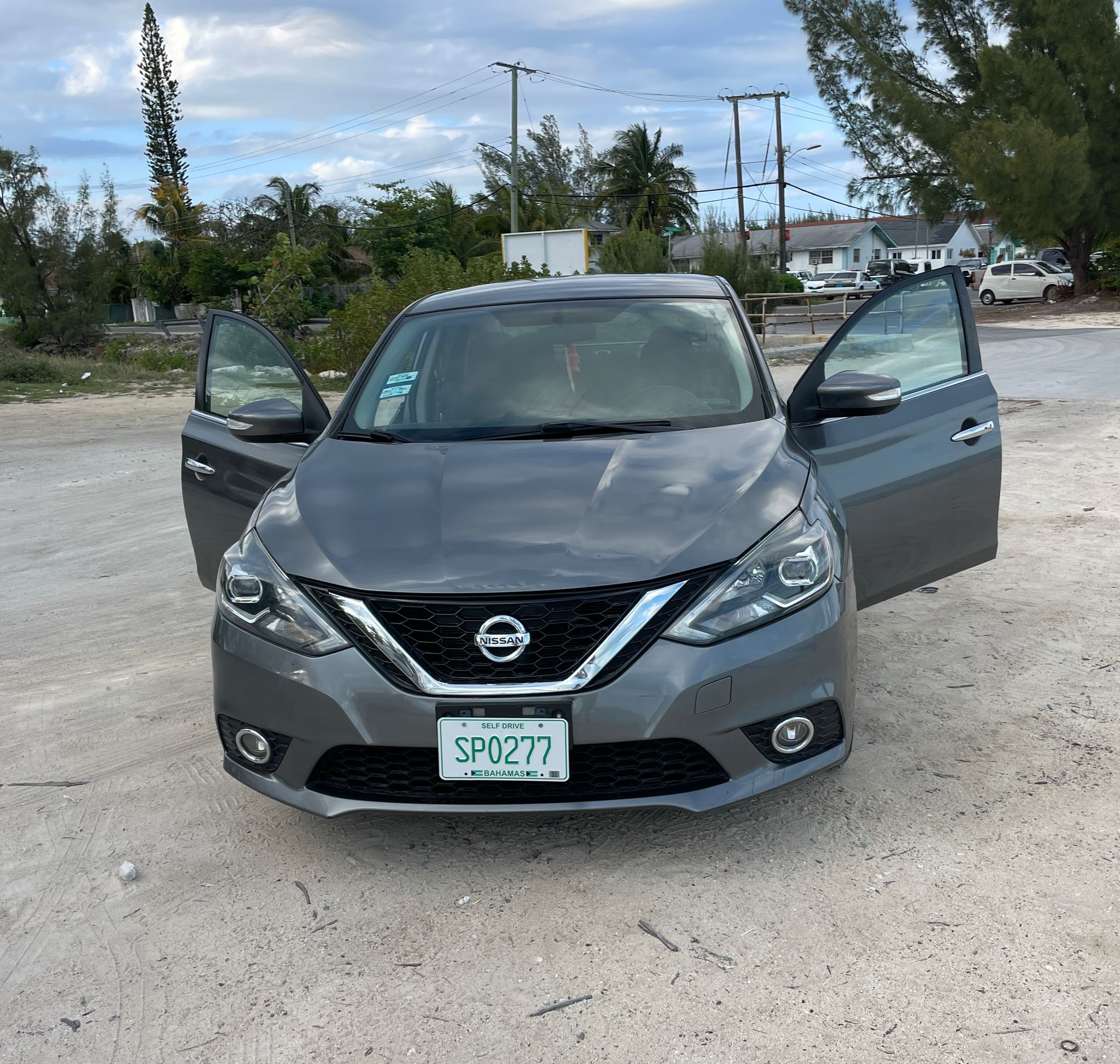 D'Luxe Rentals Nissan Sentra — Car Rental Nassau Bahamas